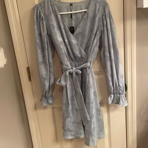 Long sleeved knee length party dress